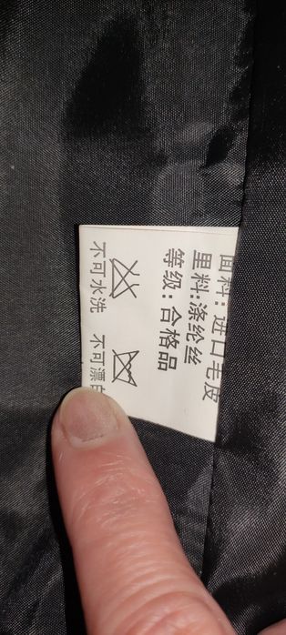 Дамски пухен елек с качулка