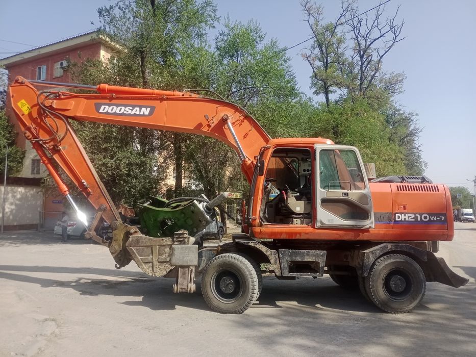Услуги колёсные эксковатора
