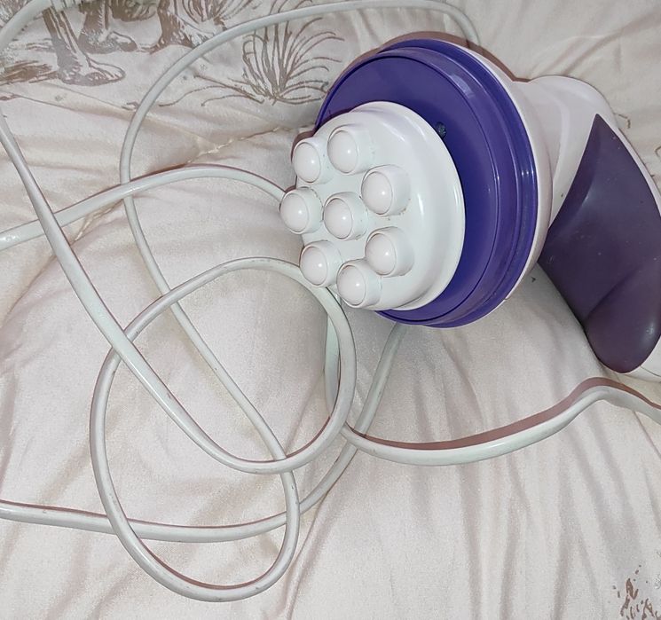 Массажёр ручной универсальный фирмы "Mambo"