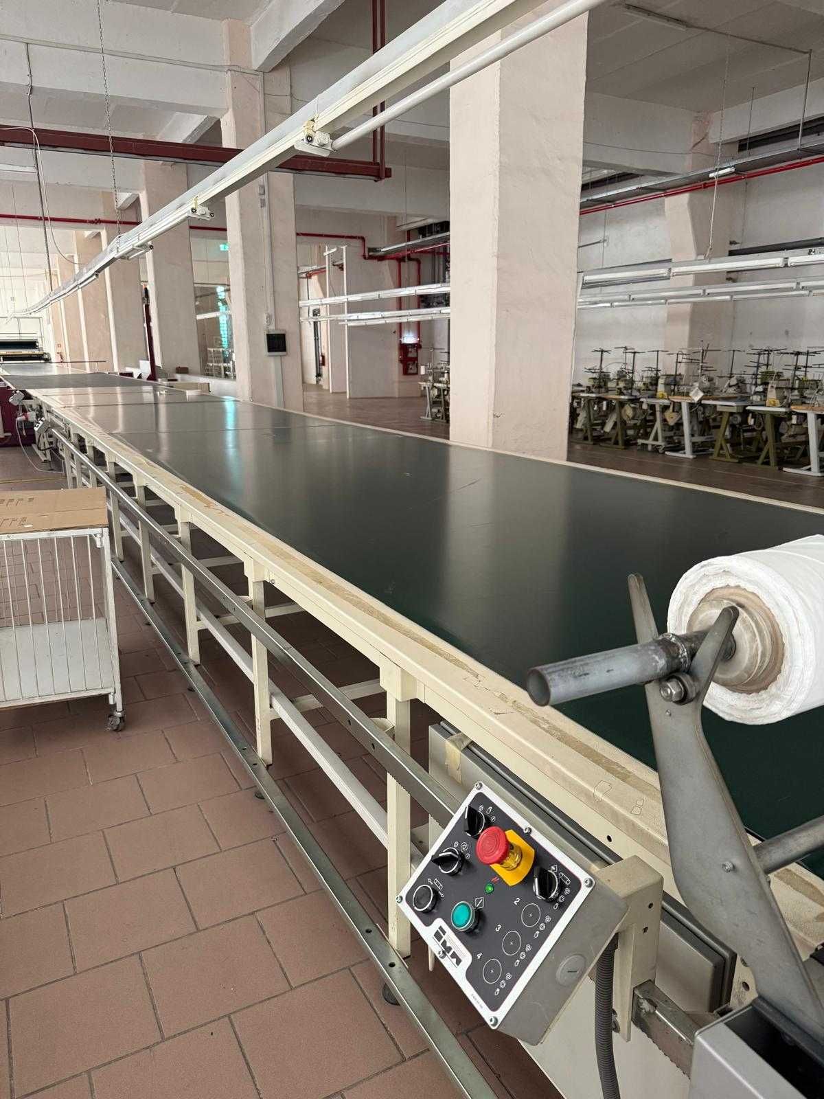Masa croitorie conveior - manipularea automată a straturilor