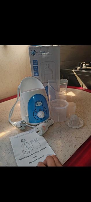 Încălzitor biberoane auto