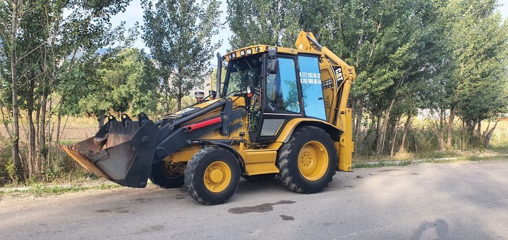 Аренда услуги экскаватор погрузчик 3в1 трактор