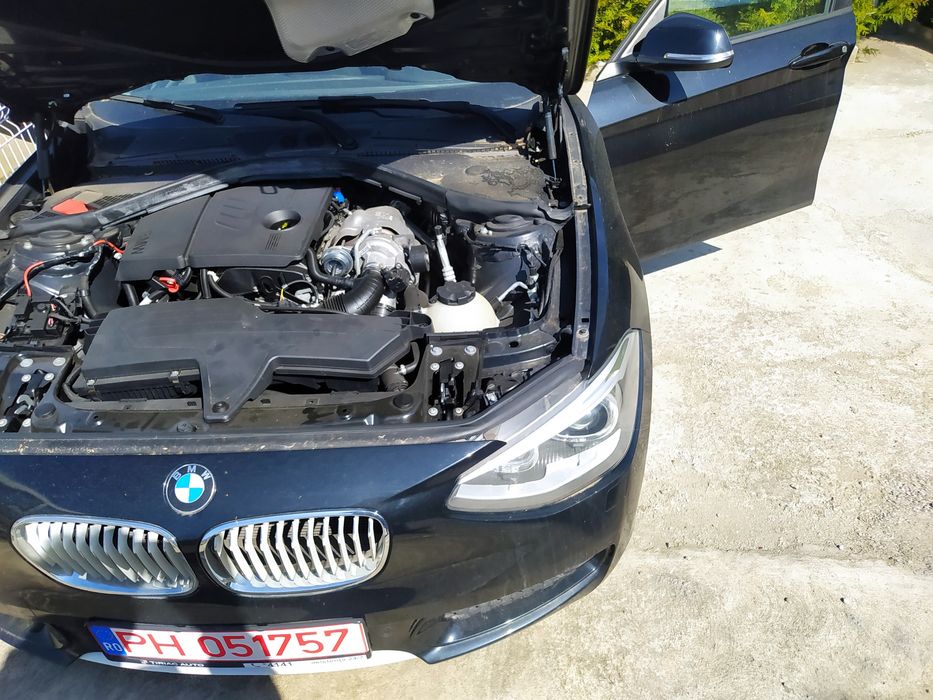 BMW 116i, fabricație 2012 
- keyless go
- dublu climatronic
- star&