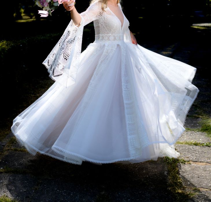 Rochie de mireasă,  purtată o singură dată,  mărime S/M, model deosebi