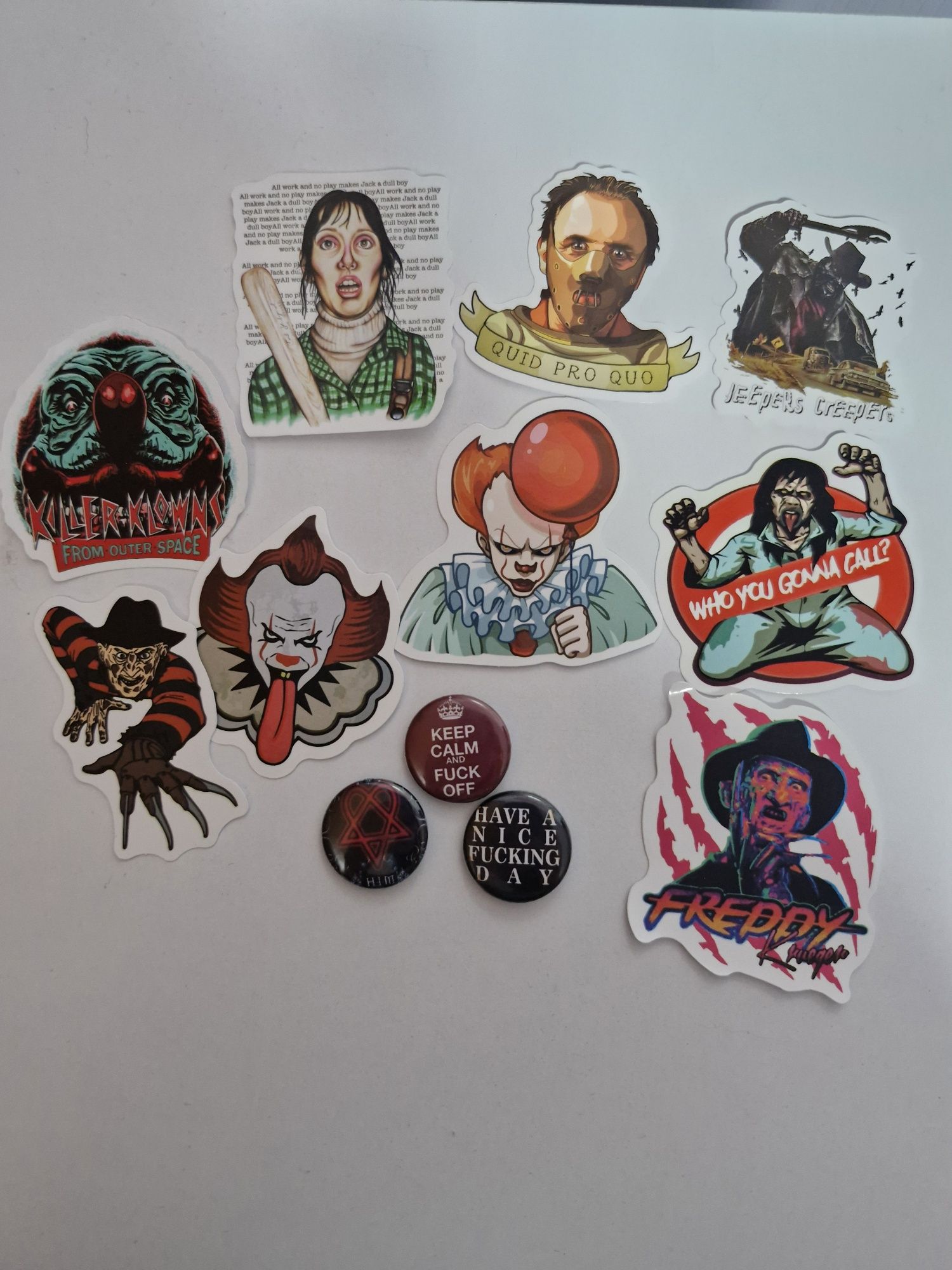 Horror movie stickers and random pins