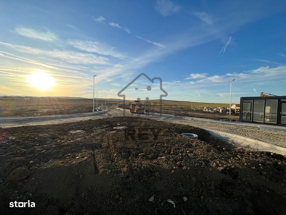 Teren cu autorizație de construcție și utilități