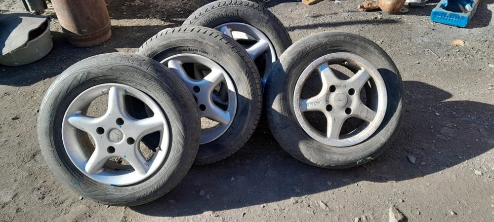 Титановые диски 4х114.3 с резиной.