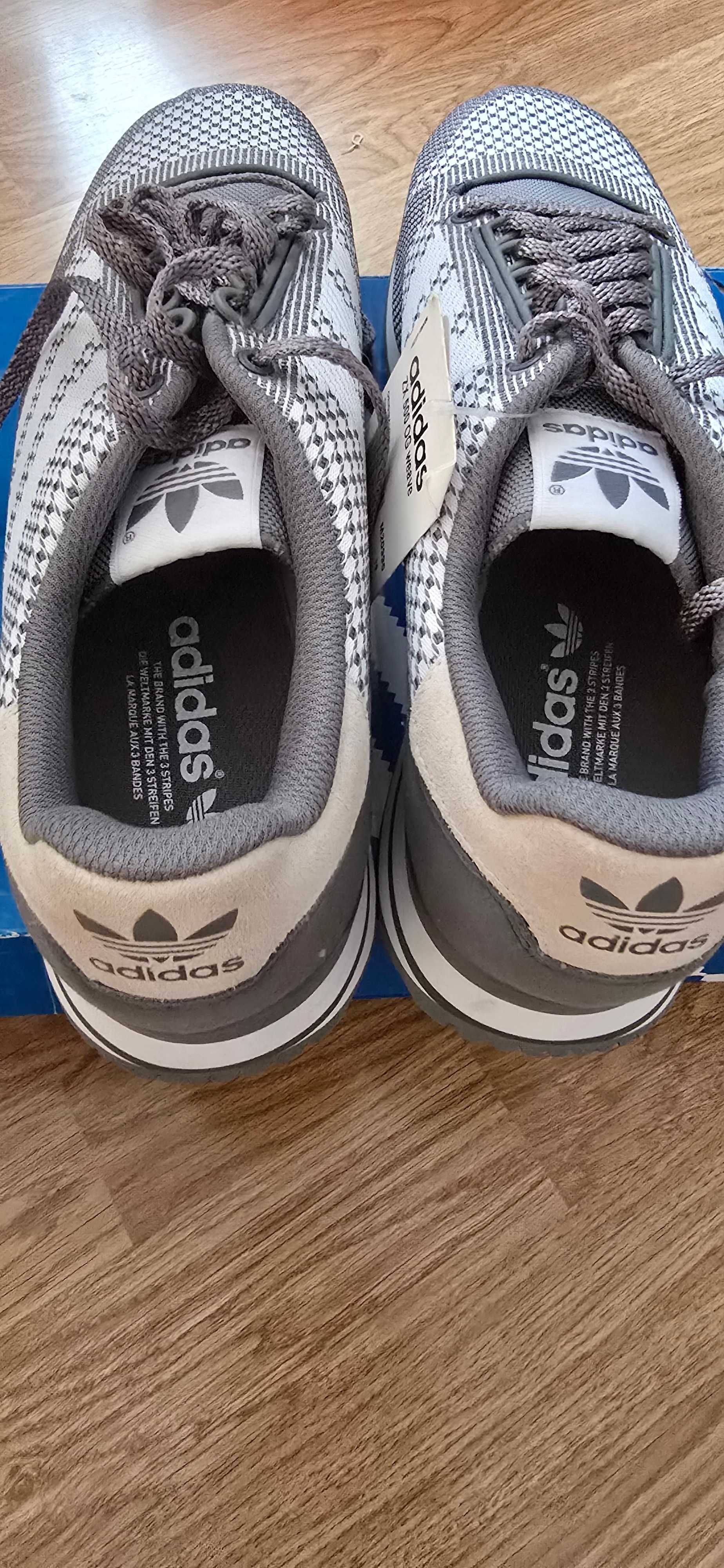 Чисто нови оригинални маратонки Adidas /Puma