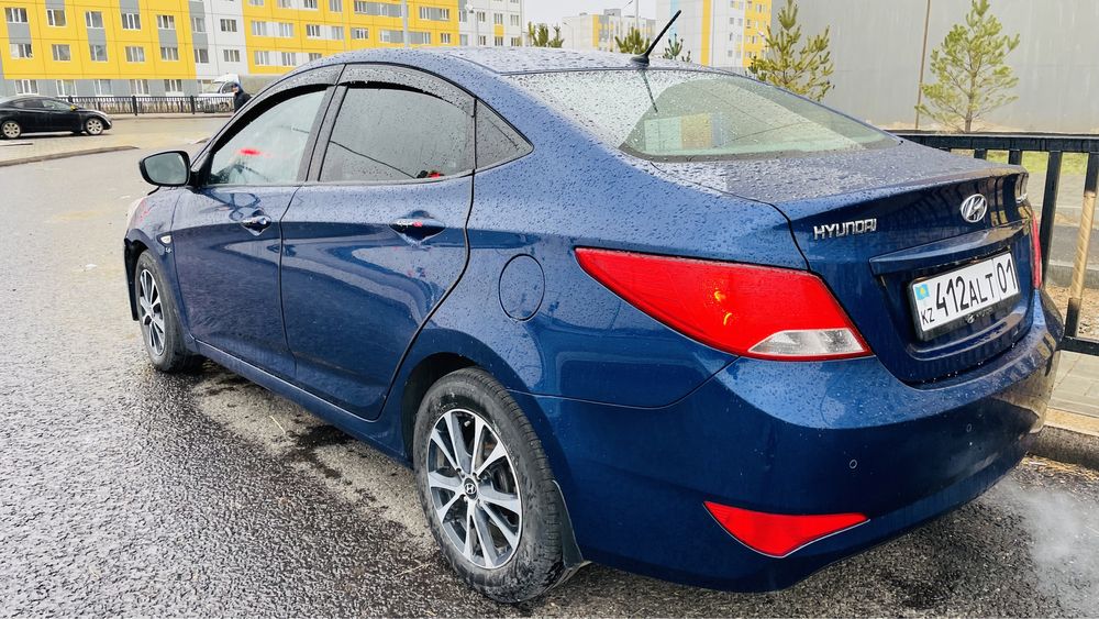 Hyundai Solaris Цвет: Синий В ухоженном состоянии, салон чистый
