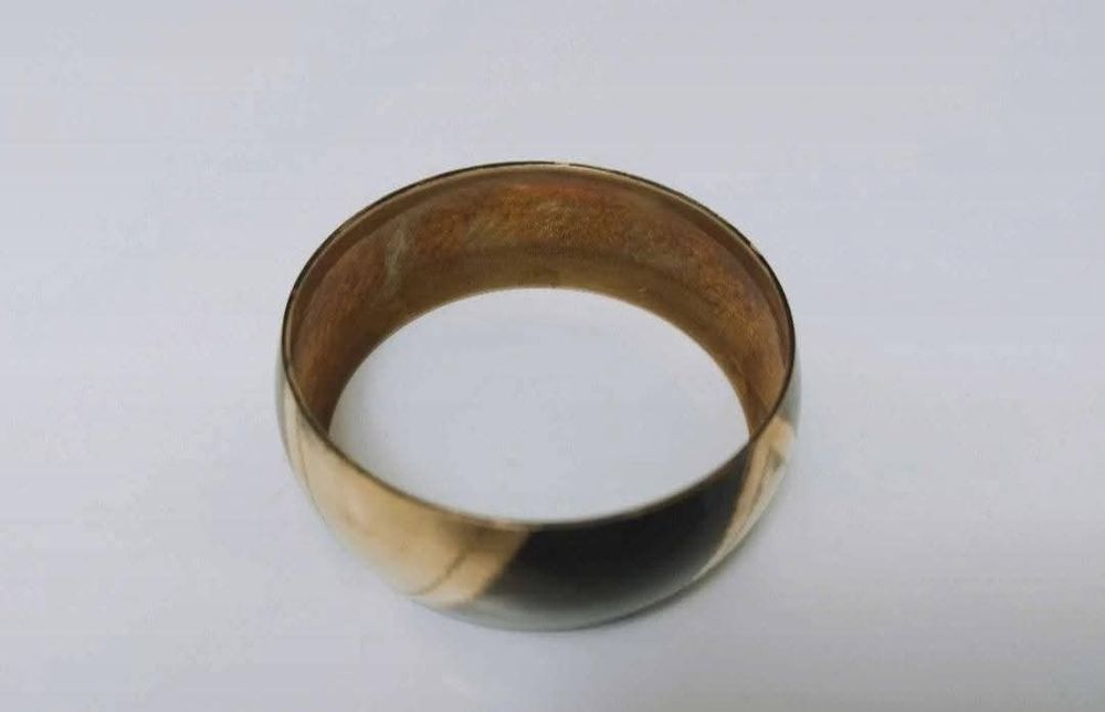 Veche bratara fixa de alama