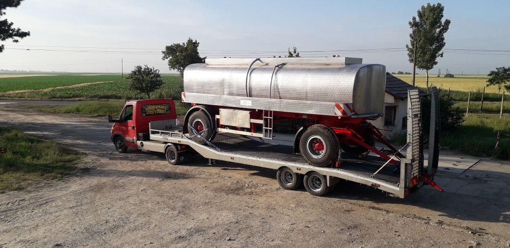 Transport utilaje . Tractări auto