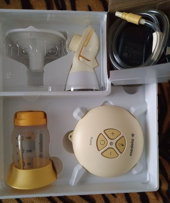 Помпа за кърма Medela Swing Flex+книга за кърменето+аксесоари подарък