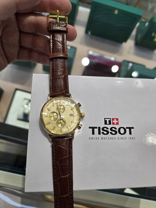 Продам золотые часы Tissot, немного ношенные, но в идеальном состоянии