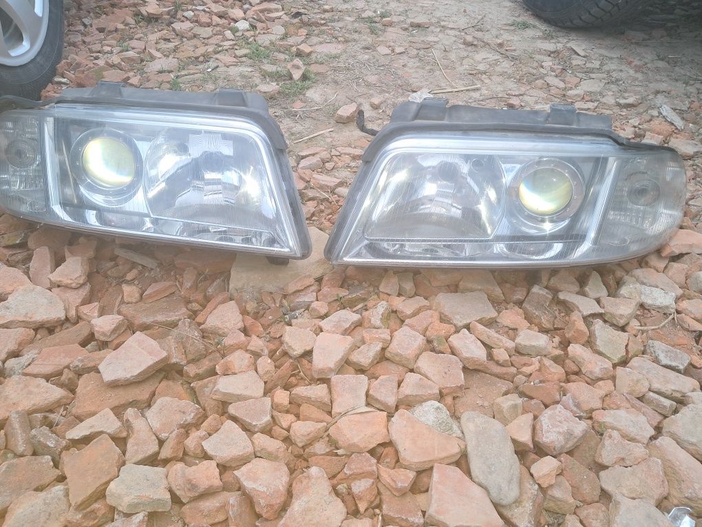 Vând faruri cu lupa audi a4b5