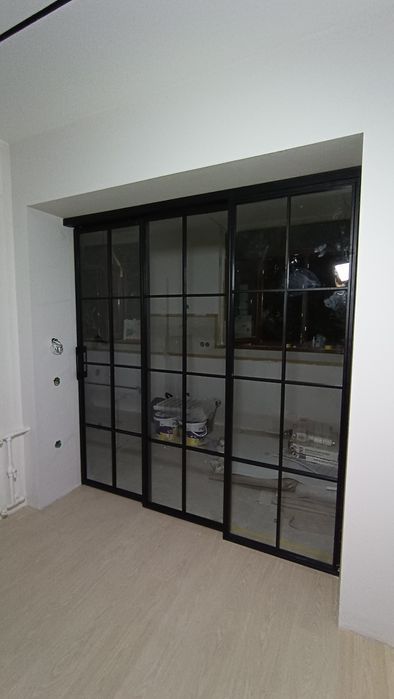 Стеклянные раздвижные перегородки в стиле лофт