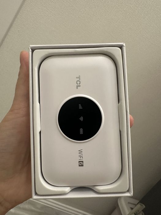 Портативный можем роутер TCL
