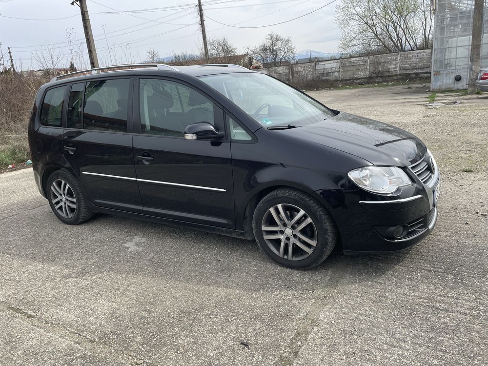 Vand vw touran 1,4 tsi 140cp( benzina)
