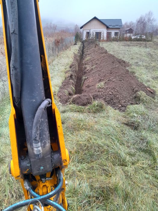 Buldoexcavator de inchiriat,prestări servicii