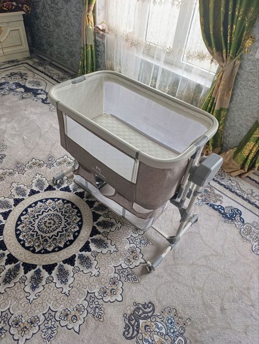 Chaqaloq uchun Elektron belanchak kravat