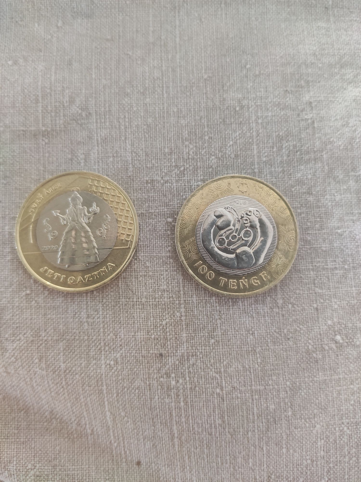 Коллекционные монеты 100 ТГ.