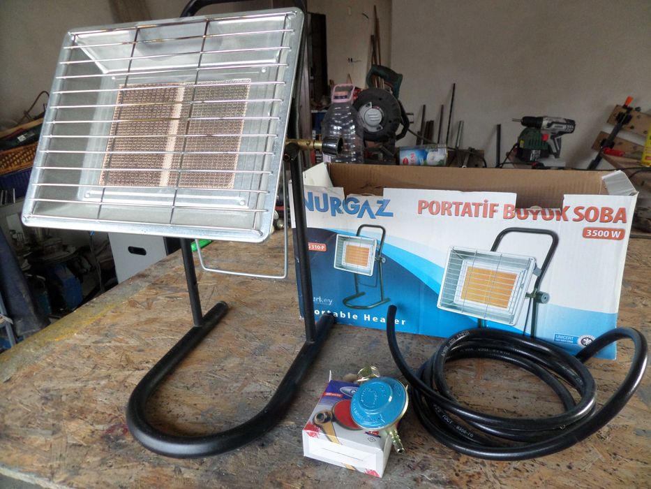 Incalzitor,soba,resou pe gaz cu suport, ceas de butelie, furtun, nou