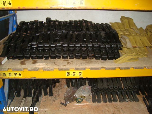 Dinti centrali si coltari buldoexcavatoare Caterpillar Jcb Komatsu