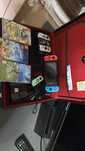 Nintendo Switch с 4 игри и общо 7 joy-con-a