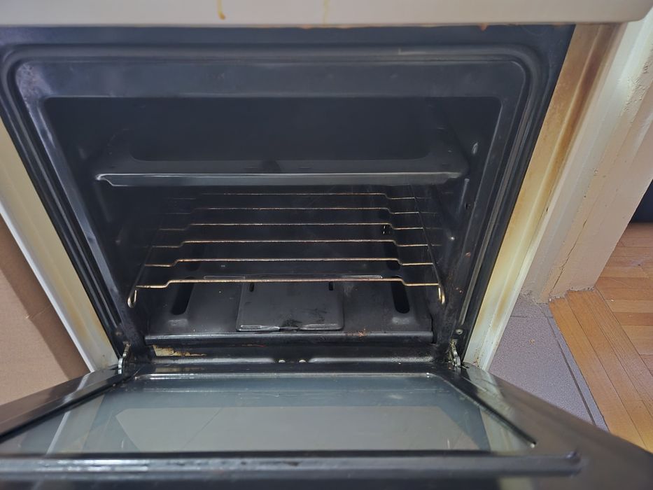 Aragaz,gaz,4 ochiuri si cuptor,Zanussi