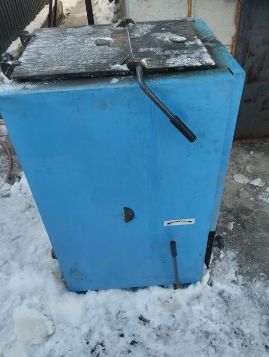 Котел на твердом топливе Будерус