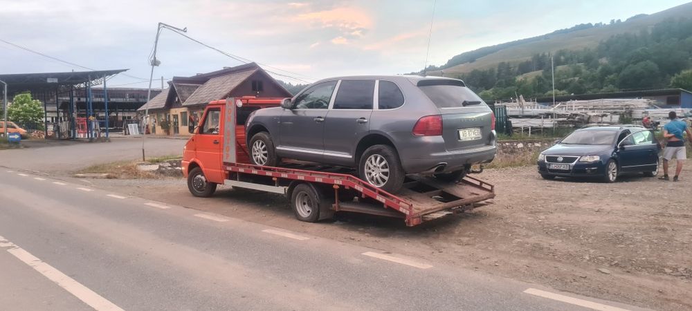 Tractari auto platforma transport utilaje trailer slep recovery
