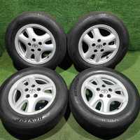 Продам Диск оригинал Toyota с шинами Dunlop 205/65 R15 летний