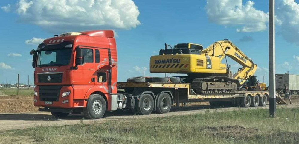 Услуги трала. Перевозка спецтехники. Перевозка негабаритных.