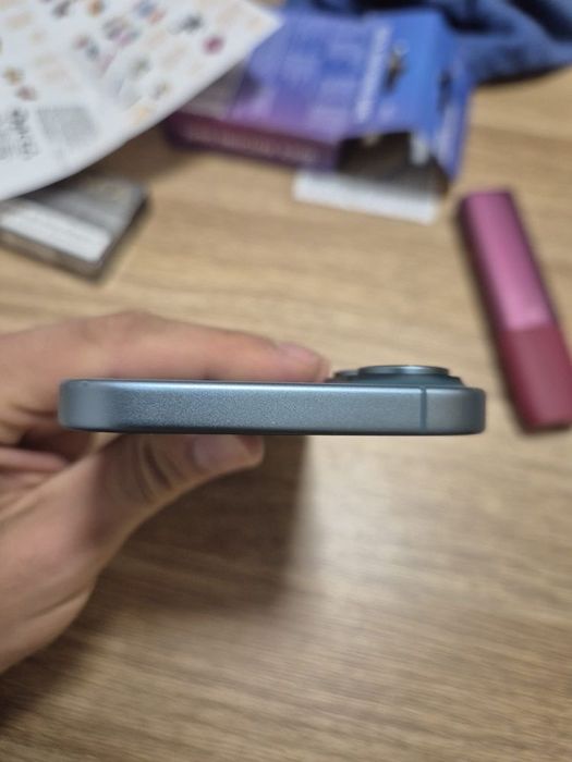 iPhone 16 Teal in garantie