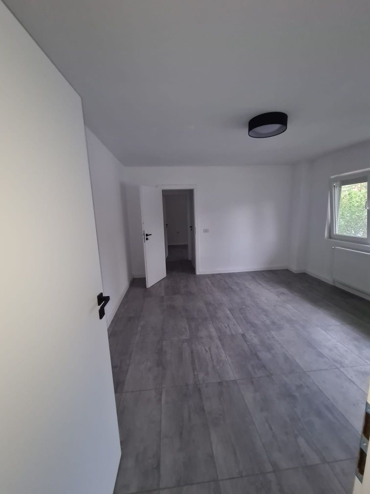 Apartament doua camere,parter inalt