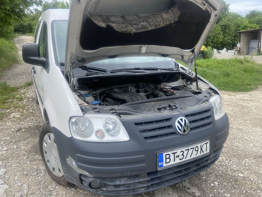 VW Caddy 2.0метан-Бензин