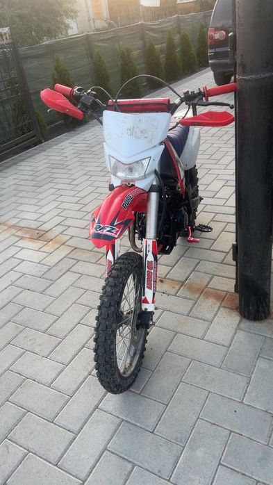 Cross RXT 125cm³
