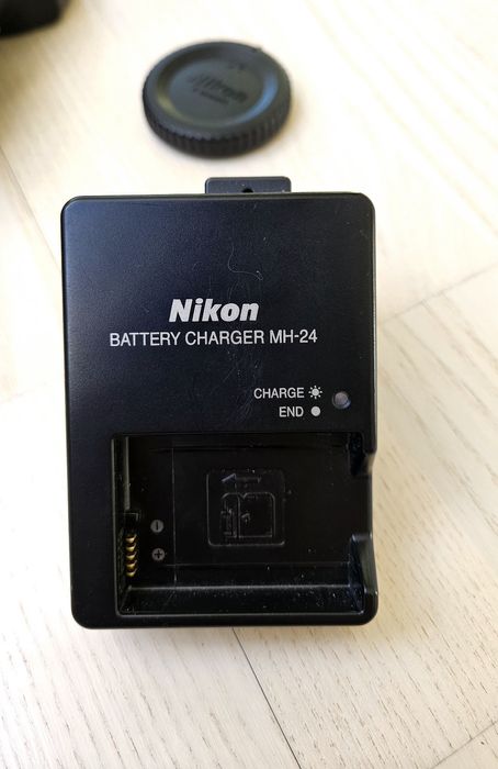 Nikon D3200l SLR camera with an 18-55mm VR lens.