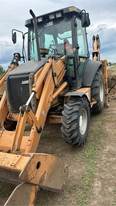 эксковатор погрузчик 3в1