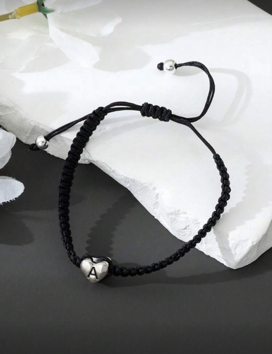 Гривна с буква