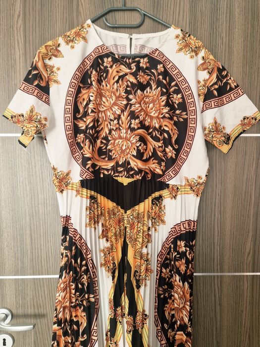 Rochie plisata vaporoasa