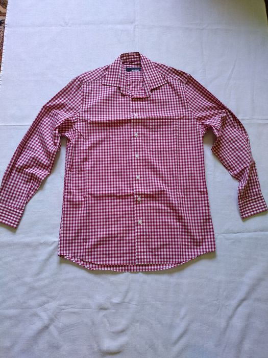 L. 100 % bumbac. Aproape nouă.