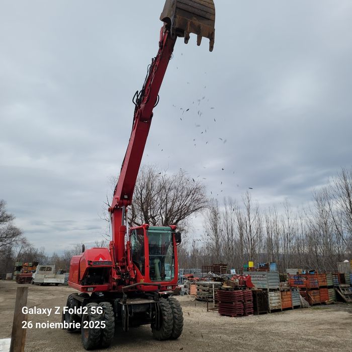 Escavator Caterpilar pe roti nu merge în parametri