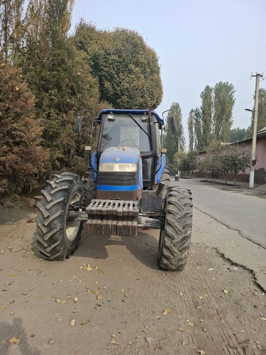 Трактор  NEW HOLLAND тс 135