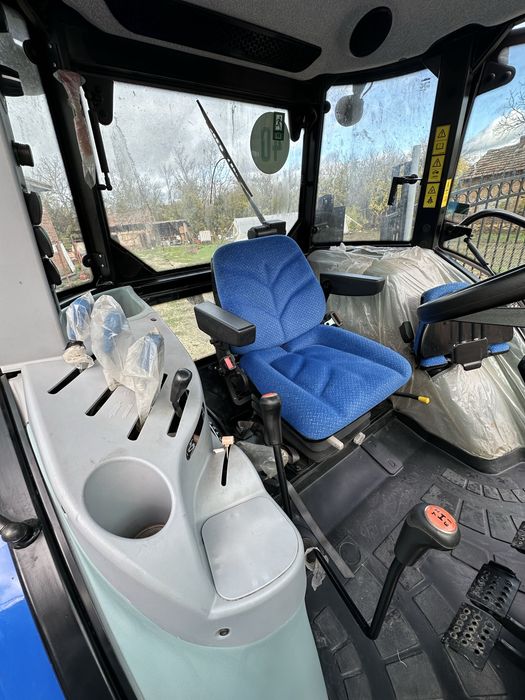 Трактор New Holland TD5.95 с плуг Madara