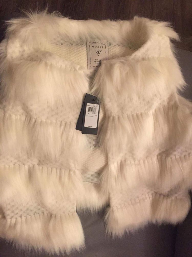Елек Guess.