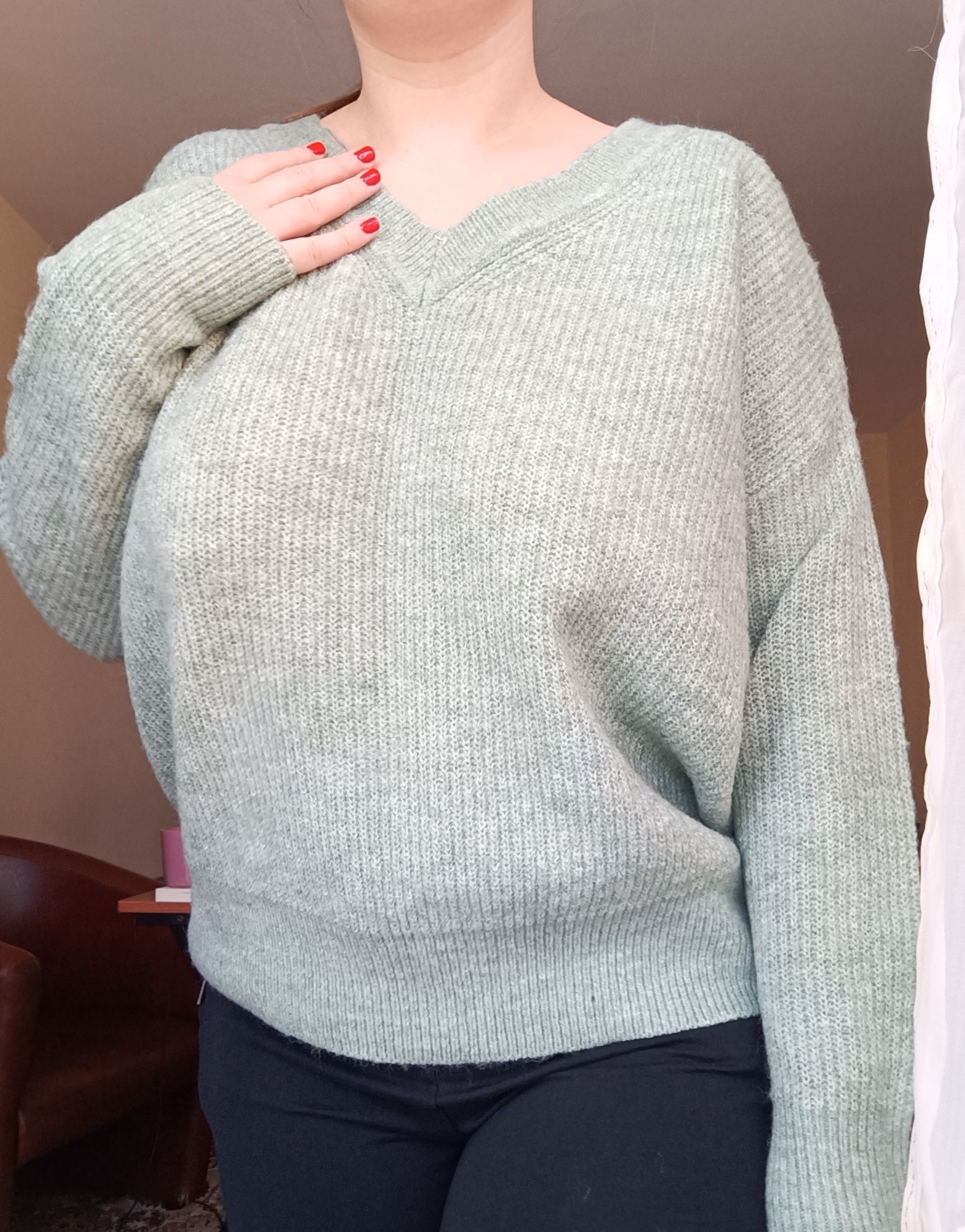 Pulover verde in stare perfecta