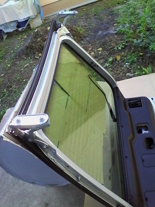 Haion luneta Renault Laguna,inchidere elect.,motoras stergator,brat..