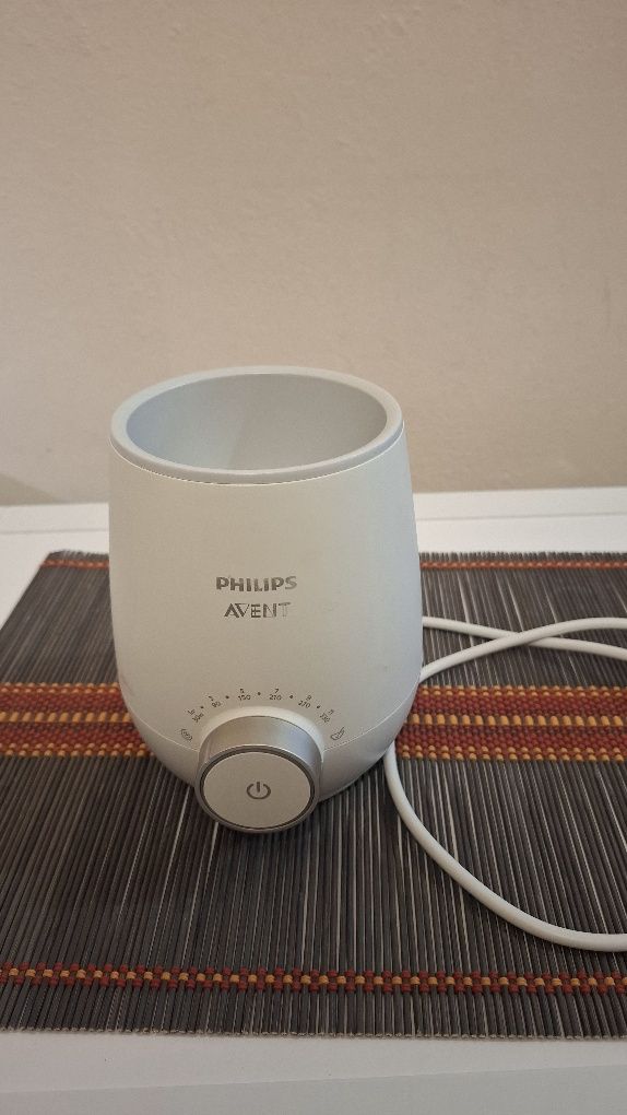 Philips уред за затопляне  и размразяване на бебешки шишета и храна за
