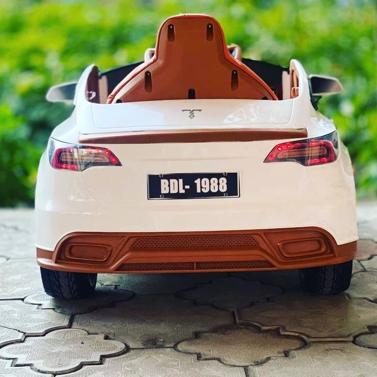 Детская машина Тесла электромобиль с крутым дизайном подарок для детей