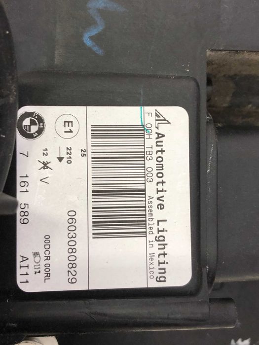 Far bixenon stanga original BMW X5 E70